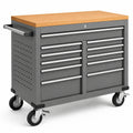 Carro de herramientas de metal gris con superficie de madera